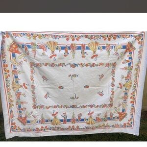 Party it up with this cool Vintage White Tablecloth Folk Motif